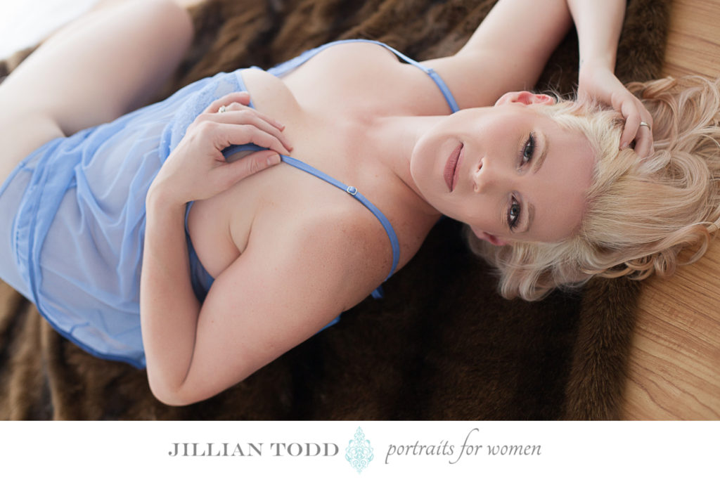 boudoir sacramento blonde woman on floor with fur rug